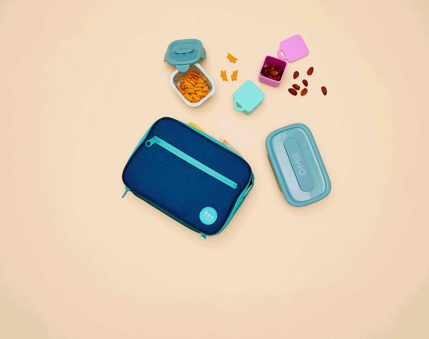 GIF of food containers inside the Ten Little Insulated Recycled Lunch Box - Navy & Green. Available at www.tenlittle.com