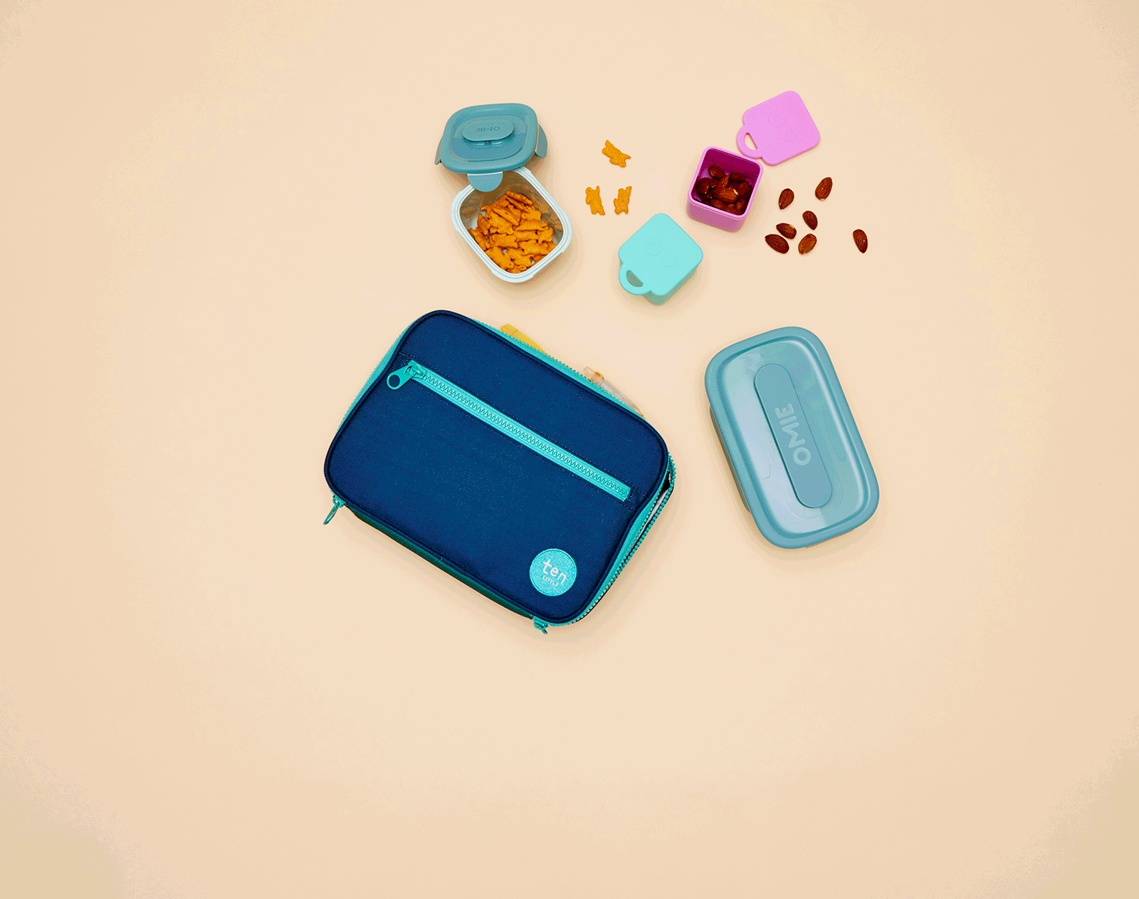 GIF of food containers inside the Ten Little Insulated Recycled Lunch Box - Navy & Green. Available at www.tenlittle.com