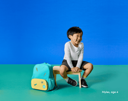Child using backpack and shoes with Ten Little Jumbo Stickers - Available at www.tenlittle.com