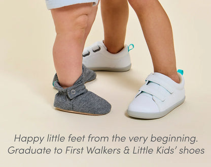 Baby wearing Ten Little Everyday Baby Booties - Heather Gray. Available at www.tenlittle.com