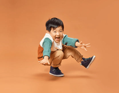 Child wearing Ten Little Everyday High Tops - True Navy. Available at www.tenlittle.com