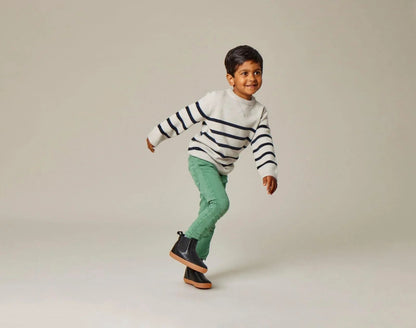 Child wearing Ten Little Chelsea Boots - Classic Black. Available at www.tenlittle.com