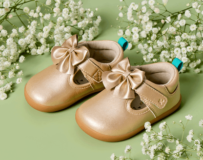 Top and side view of Ten Little Mini Mary Janes - Champagne Gold. Available at www.tenlittle.com