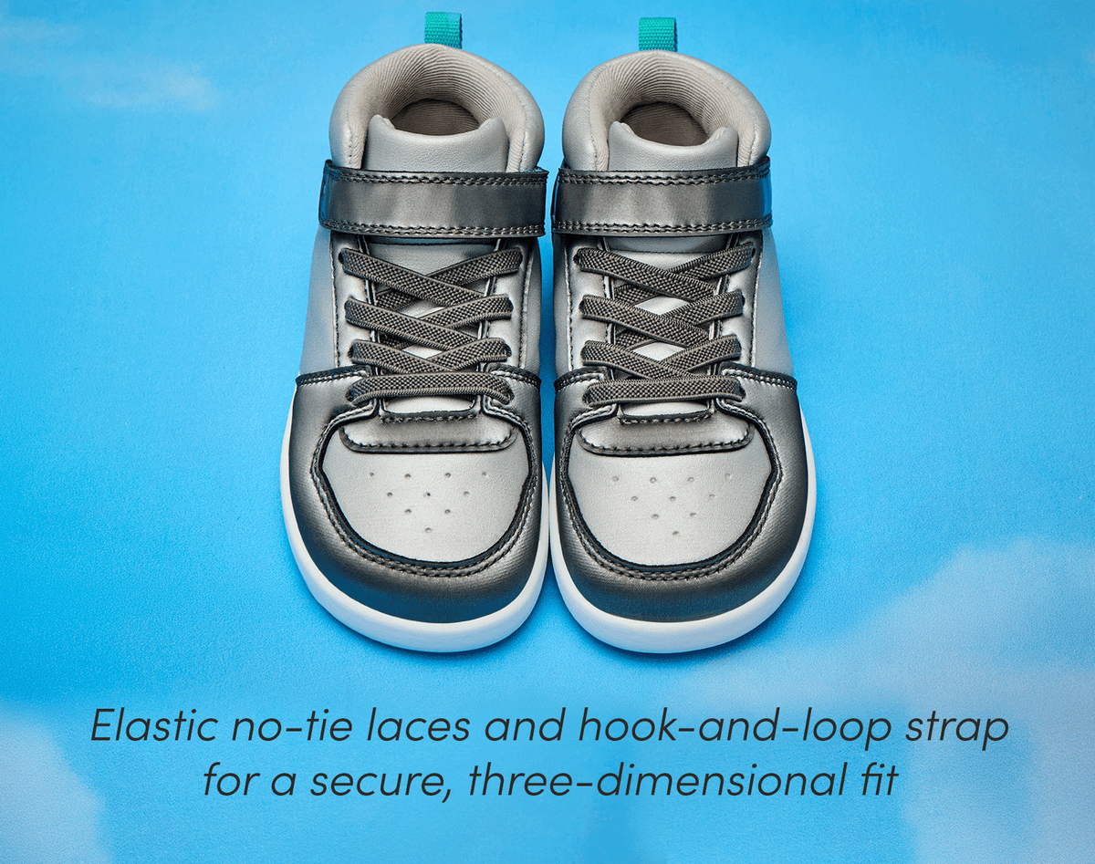 Top view of Ten Little Varsity Mid Tops featuring elastic no-tie laces and hook-and-strap for a secure, three-dimensional fit - Champion Silver. Available at www.tenlittle.com 