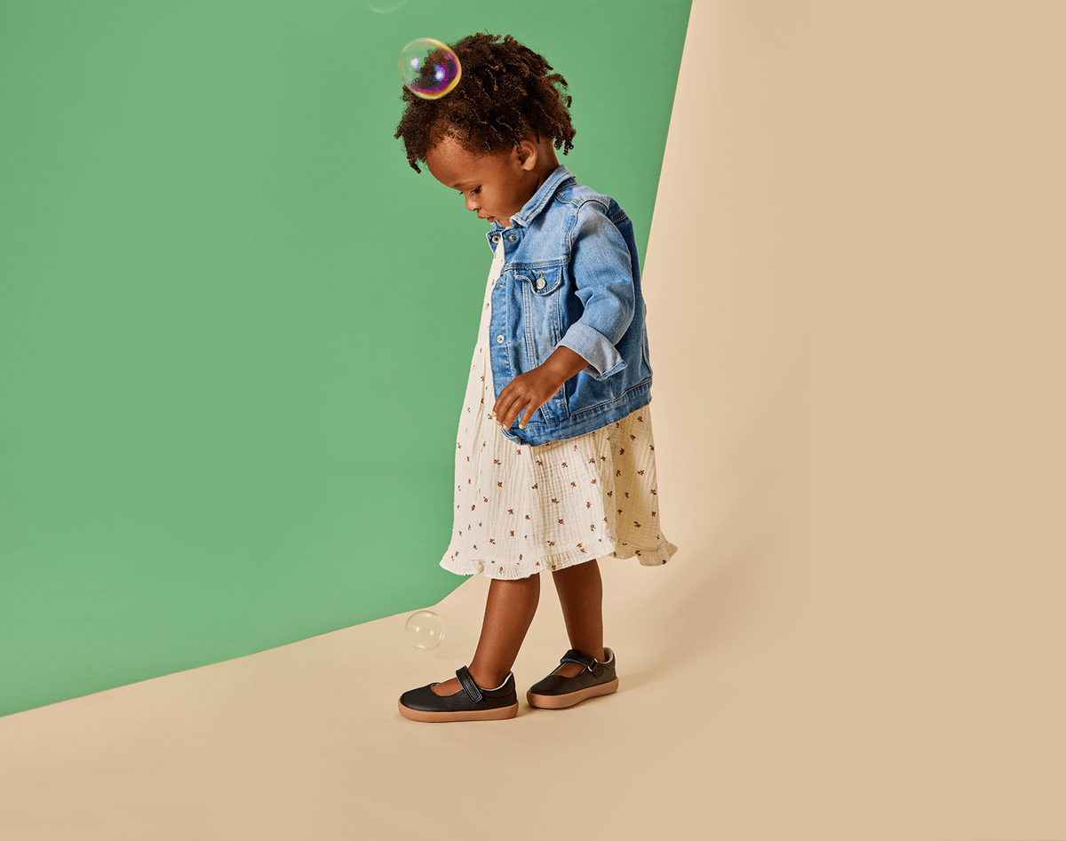 Girl wearing Ten Little Mary Janes - Classic Black. Available at www.tenlittle.com