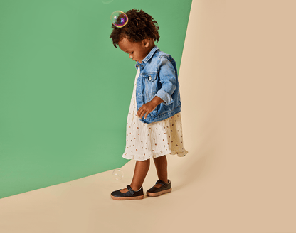 Girl wearing Ten Little Mary Janes - Classic Black. Available at www.tenlittle.com