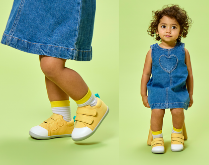 Split view of child wearing Ten Little First Walkers - Soft Yellow. Available at www.tenlittle.com