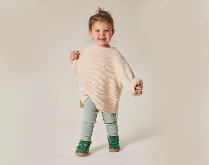 Child wearing Ten Little Furry High Tops - Emerald Green. Available at www.tenlittle.com
