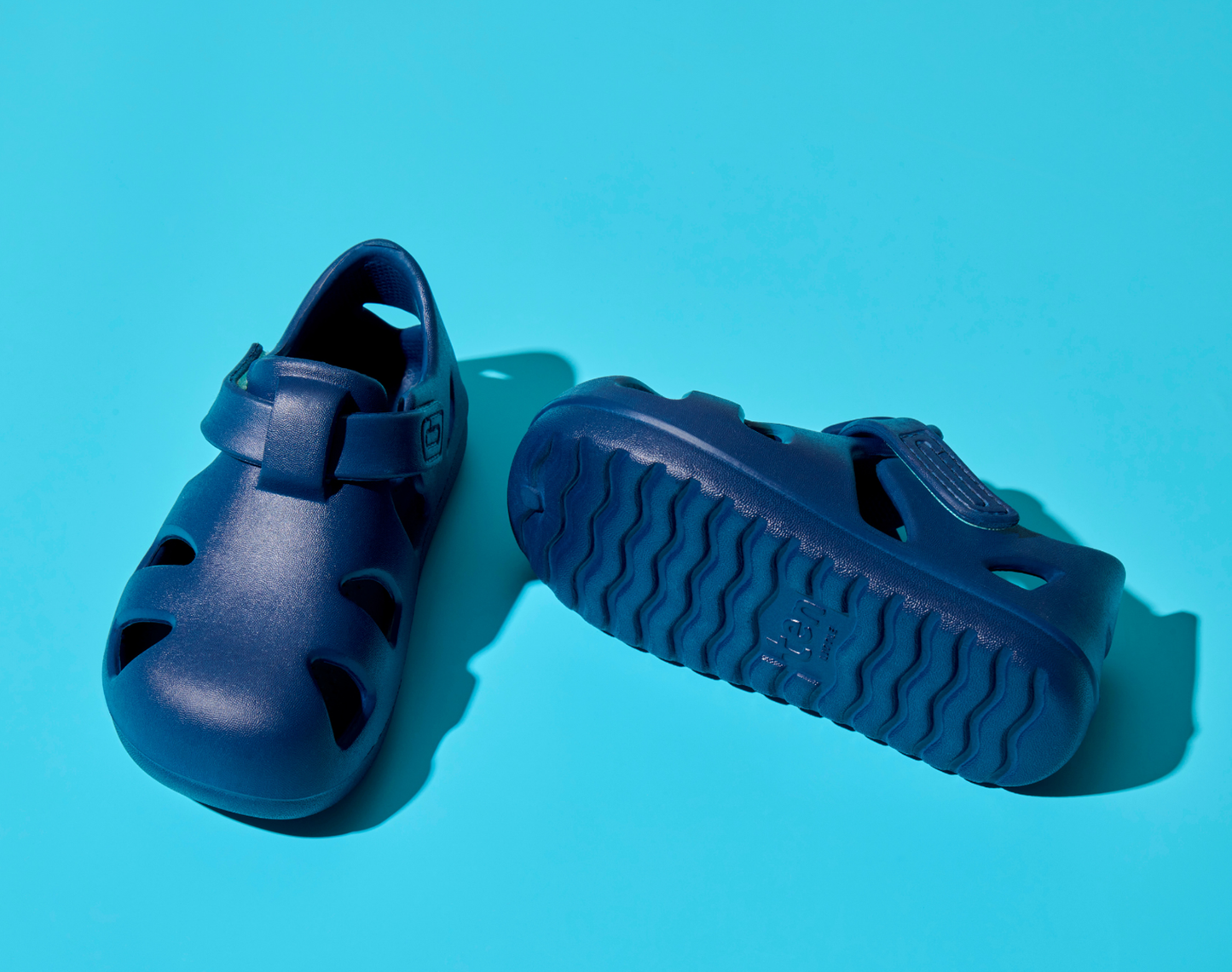 Top and bottom of shoe view of Ten Little Splash Sandals - Nautical Navy. Available at www.tenlittle.com