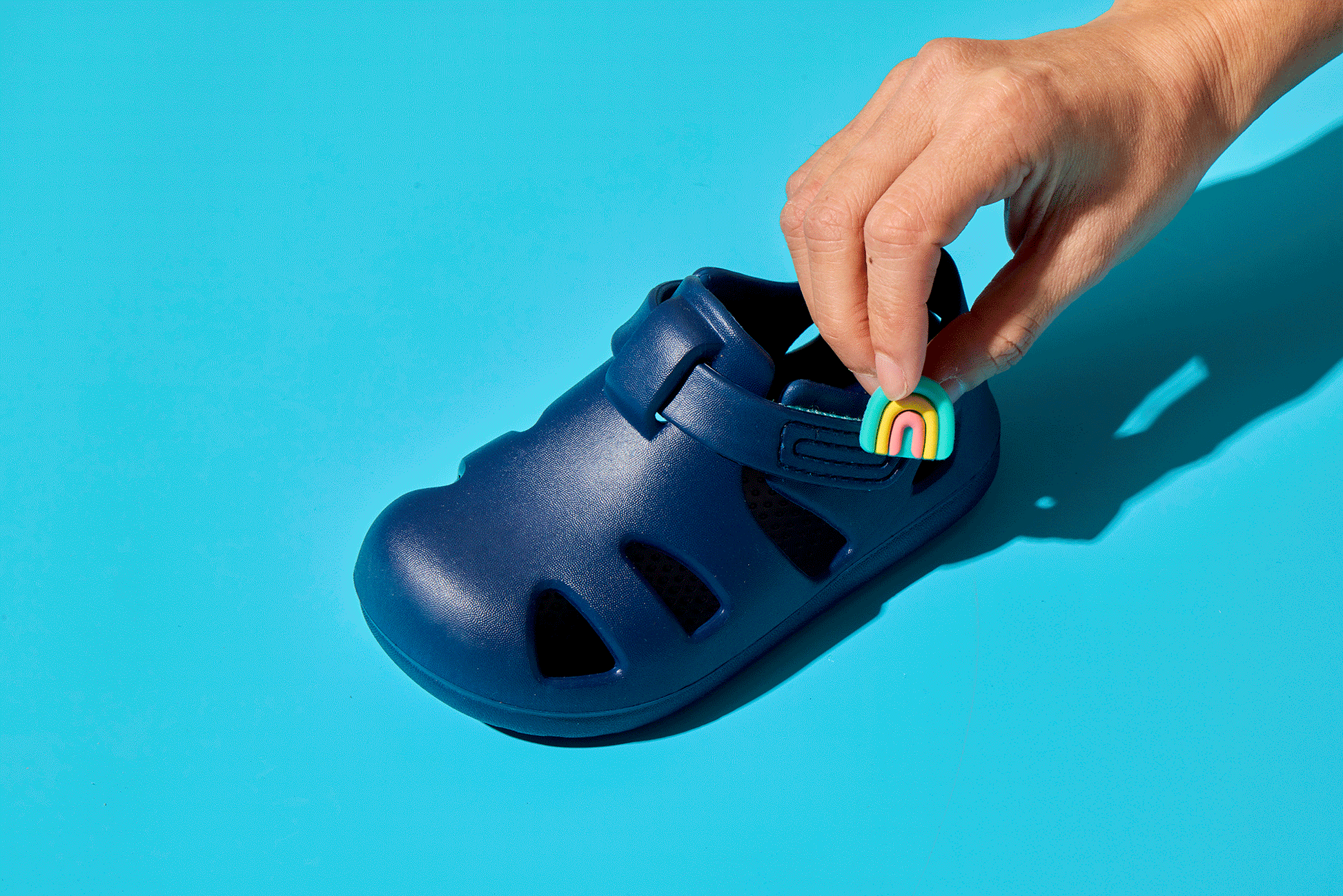 GIF putting on and taking off Ten Little Splash Sandal 2 Charms - Rainbow. Available at www.tenlittle.com