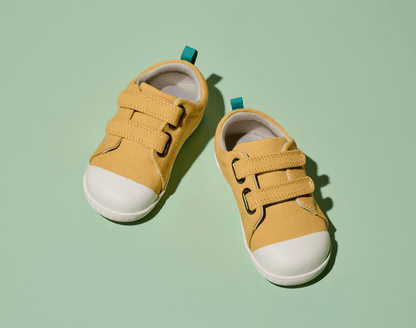 Top view of Ten Little Eco Canvas Sneakers - Mellow Yellow. Available at www.tenlittle.com