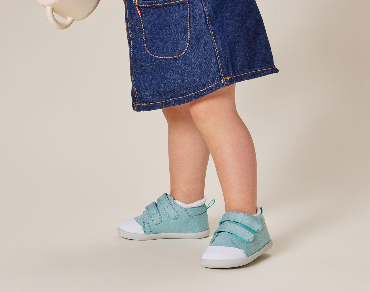 Child wearing Ten Little First Walkers - Ocean Blue. Available at www.tenlittle.com