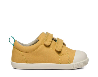 Side view of Ten Little Eco Canvas Sneakers - Mellow Yellow. Available at www.tenlittle.com