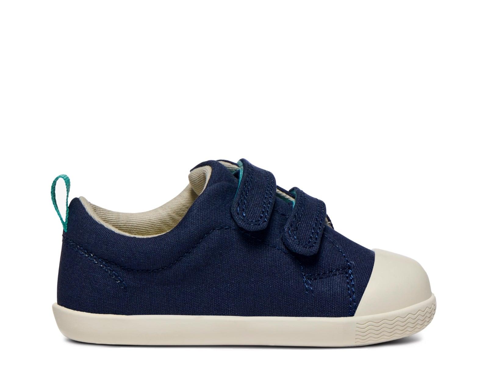 Side view of Ten Little Eco Canvas Sneakers - Navy Blue. Available at www.tenlittle.com