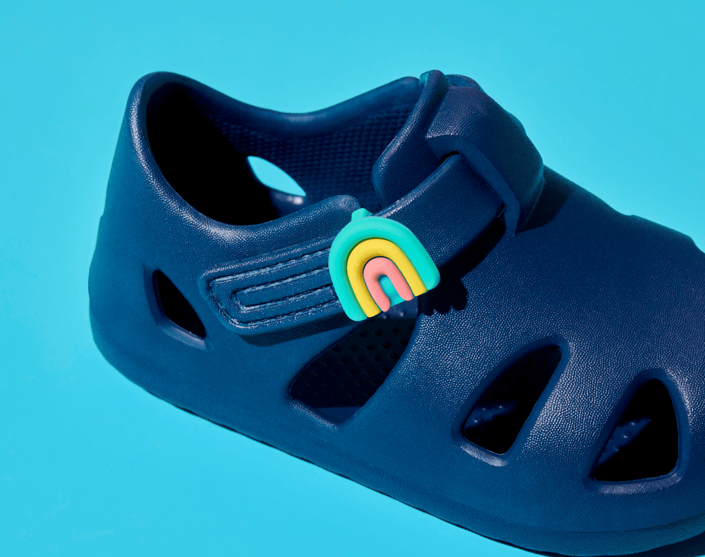 Close up of Ten Little Nautical Navy Splash Sandals with Splash Sandal Charms 2 on - Rainbow. Available at www.tenlittle.com