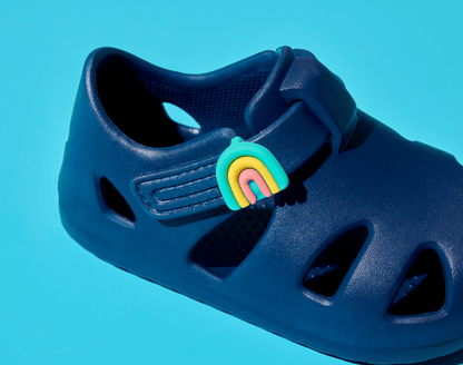 Close up of Ten Little Nautical Navy Splash Sandals with Splash Sandal Charms 2 on - Rainbow. Available at www.tenlittle.com